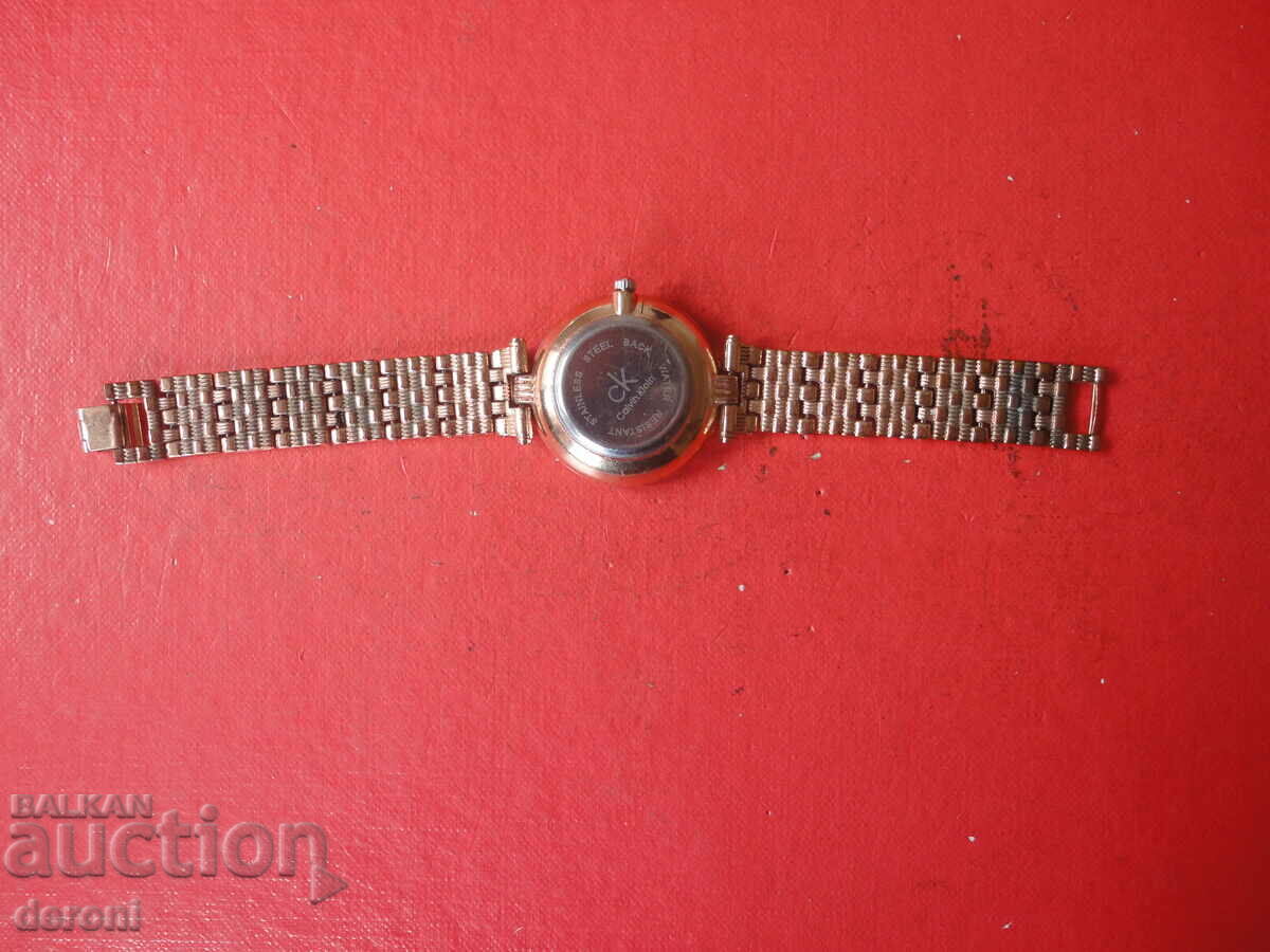 Delivery of Celvin Klain 3 crystal women's watch