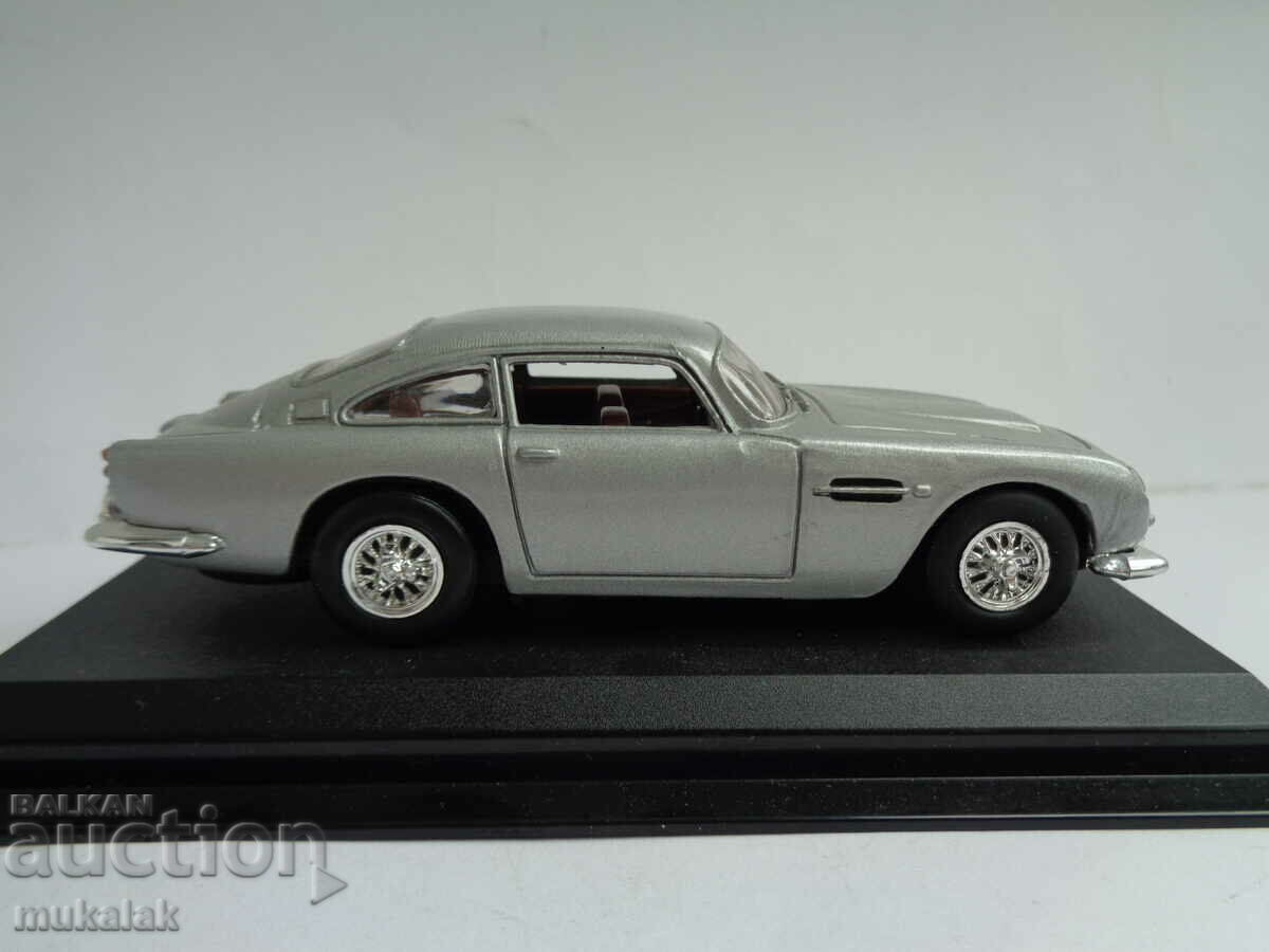 Auction 1:43 ASTON MARTIN STROLLER TOY MODEL Auction 1:43 ASTON MARTIN STROLLER TOY MODEL