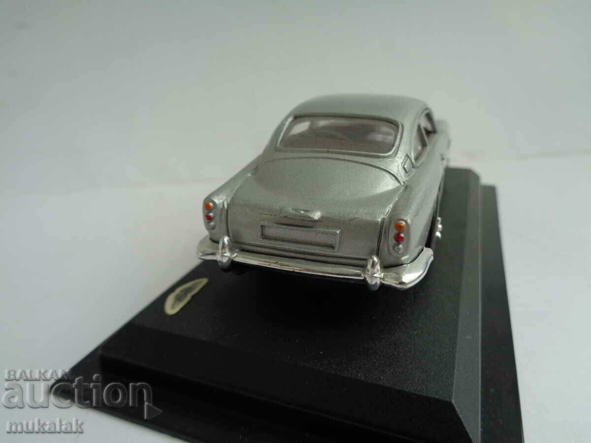 Delivery of 1:43 ASTON MARTIN STROLLER TOY MODEL Delivery of 1:43 ASTON MARTIN STROLLER TOY MODEL