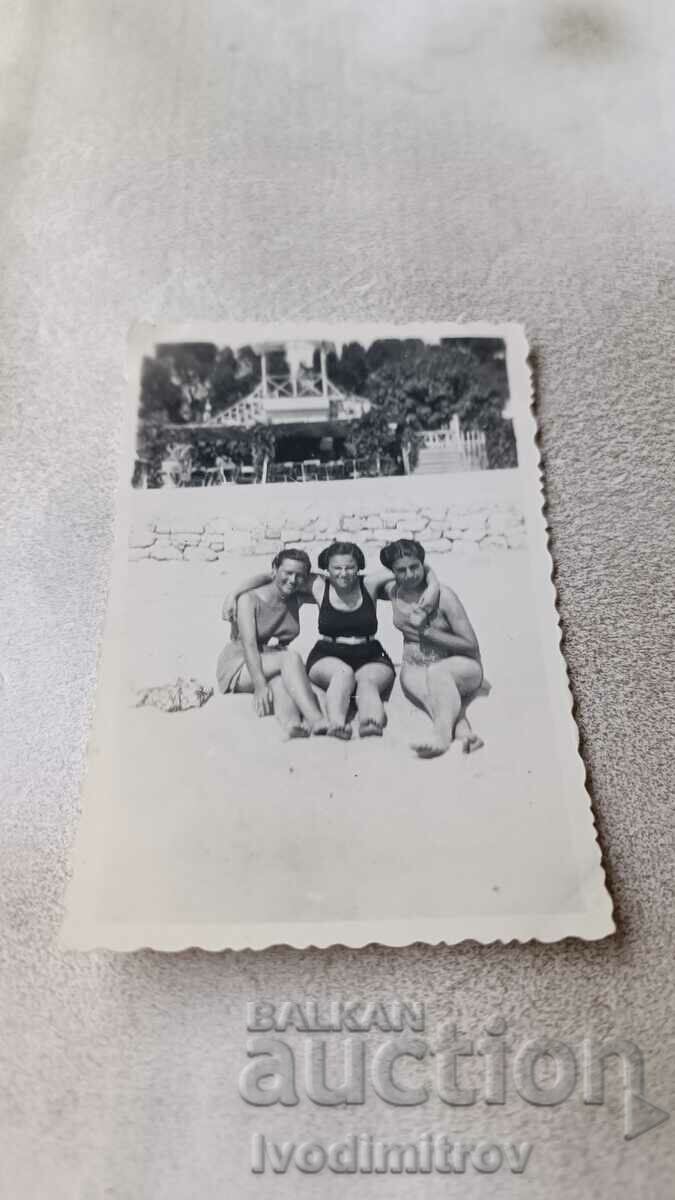 Ms. Three young girls in vintage bathing suits on the beach 1937