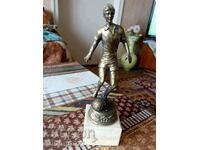 Bronze plastic football player