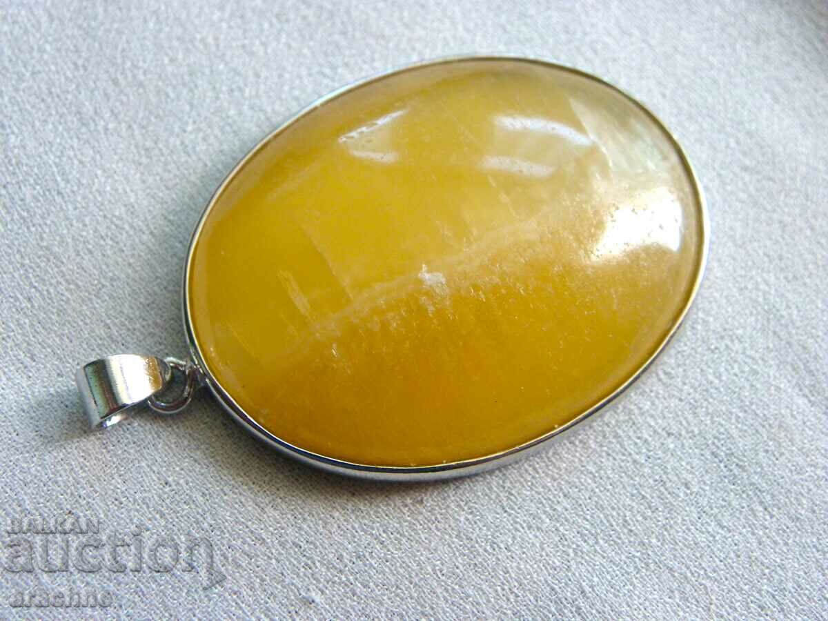 Delivery of Large, white gold plated, citrine locket Delivery of Large, white gold plated, citrine locket