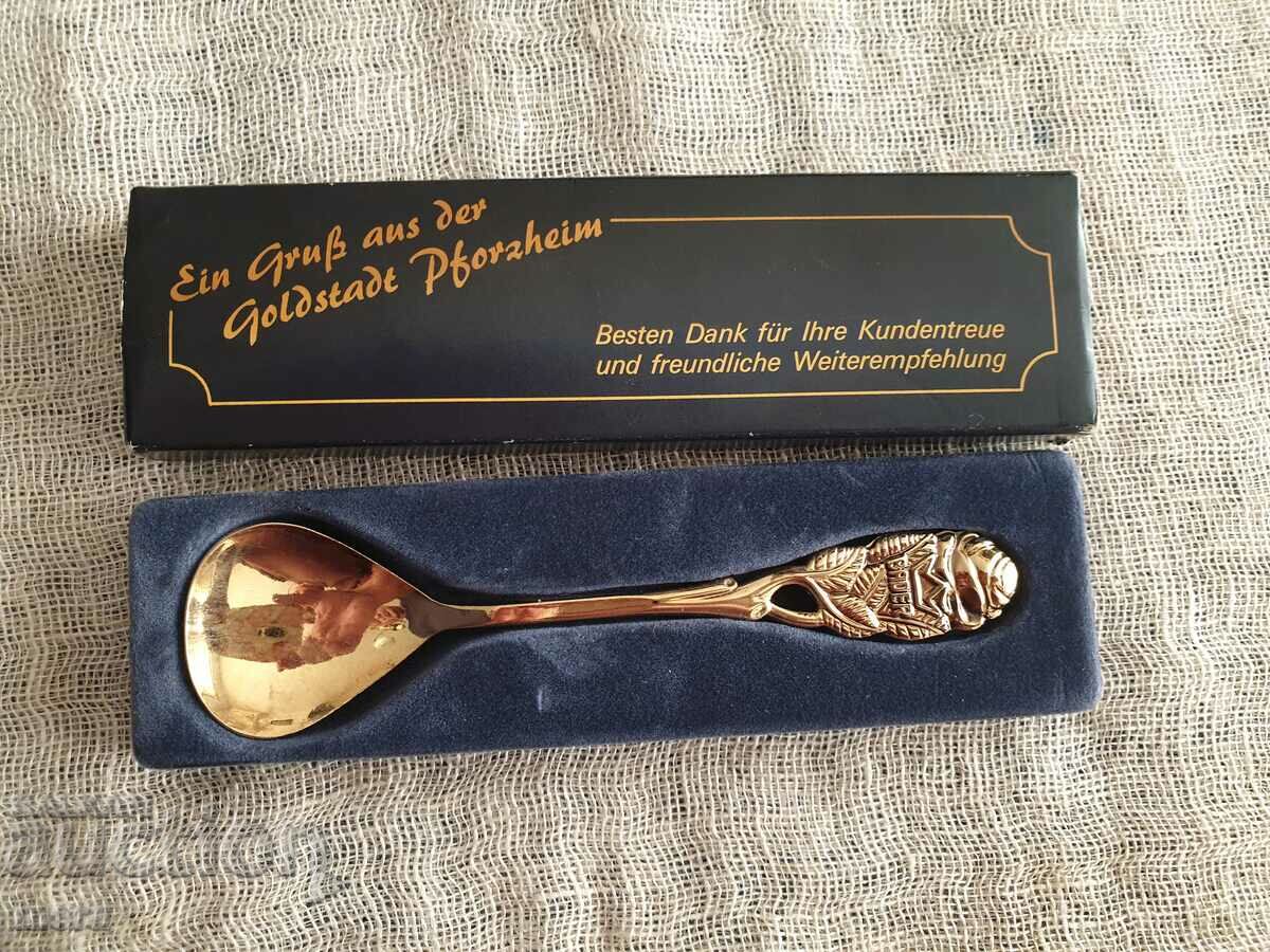 Auction Gold-plated advertising spoon Auction Gold-plated advertising spoon