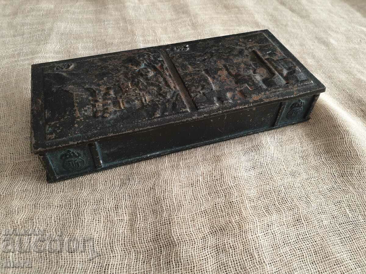 Old metal cast iron relief cast box