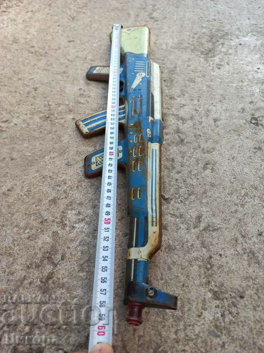 Delivery of OLD TIN TOY AUTOMATIC Delivery of OLD TIN TOY AUTOMATIC