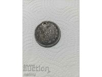 O monedă de rublă cu o gaură. Argint.