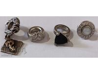 Four silver charms for a bracelet