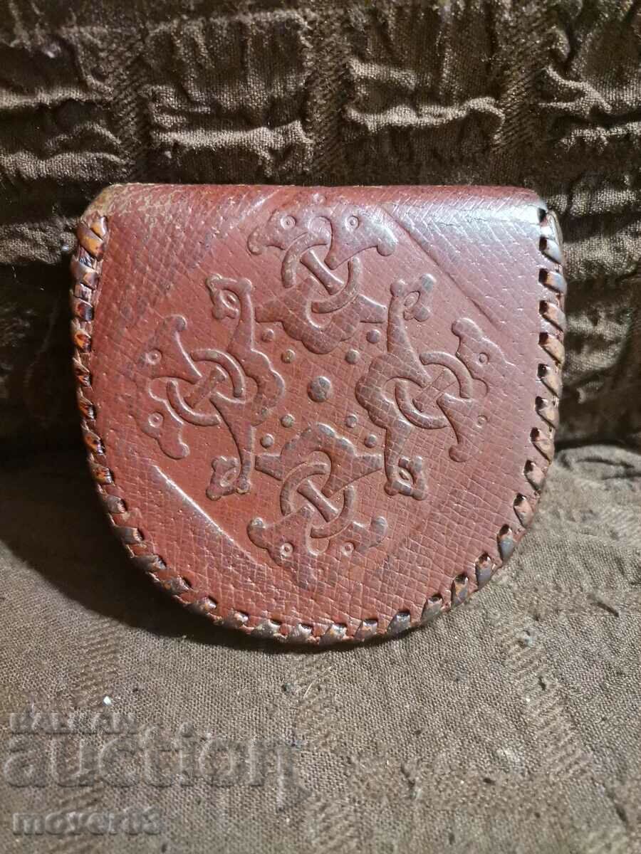 An old purse. Leather