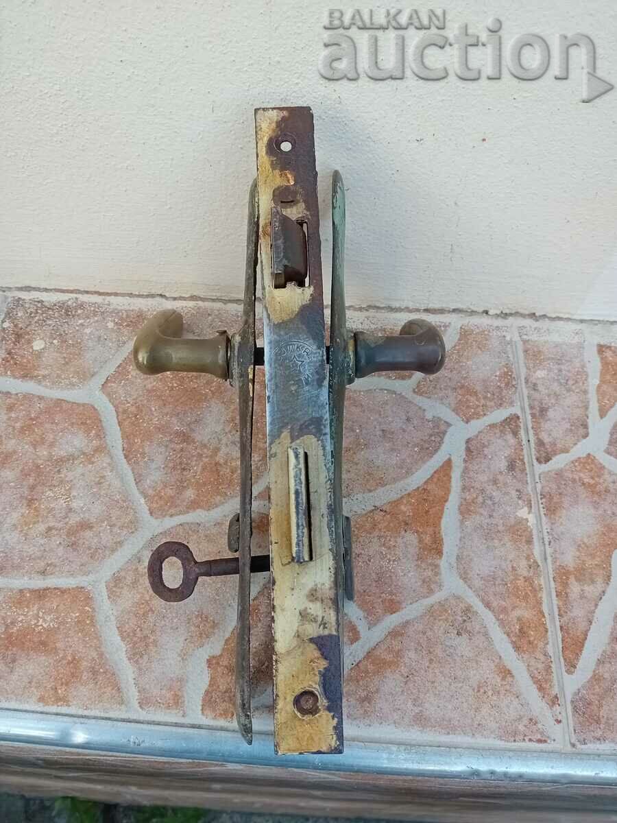 Auction  antique urban bronze lock with Vulcan FIVE-POINT key