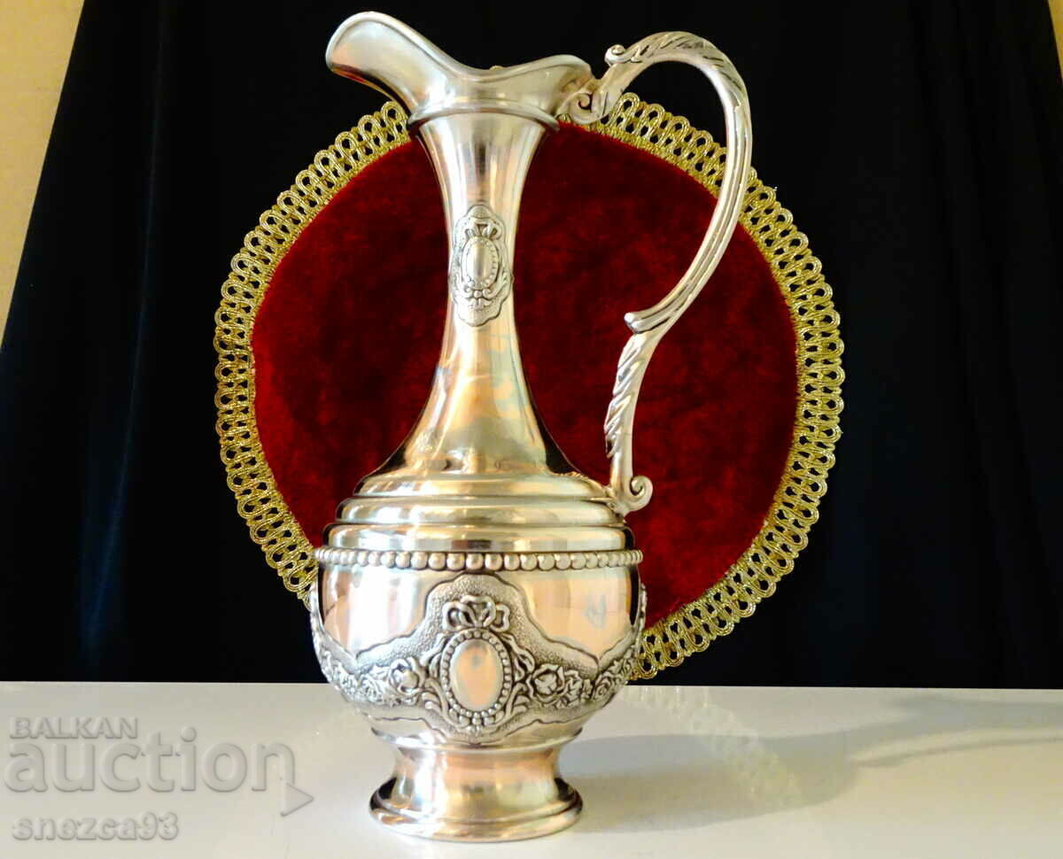Auction Silver-plated copper jug, roses, ornaments. Auction Silver-plated copper jug, roses, ornaments.