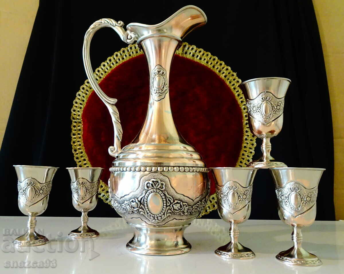 Silver-plated copper service, roses, ornaments.