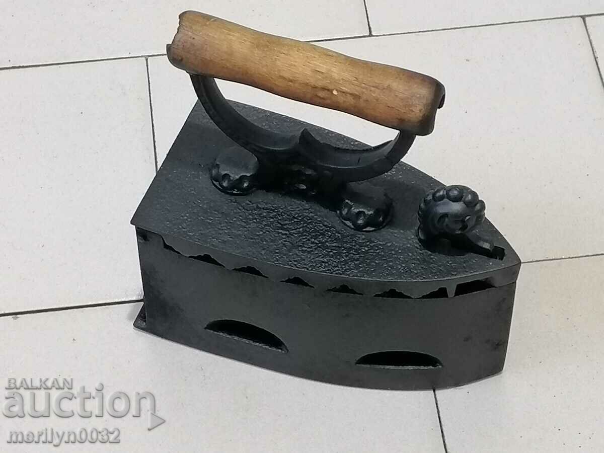 Auction  An old iron on fire