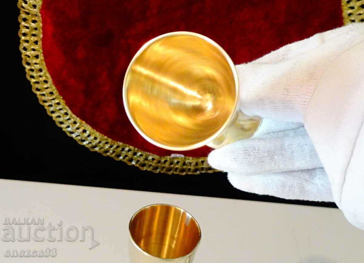 Auction  English bronze cups on a chair, tulip.