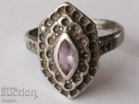Old silver ring with rose quartz.