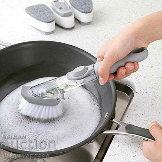 Brush for washing dishes with detergent dispenser
