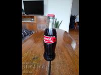 Ένα παλιό μπουκάλι Coca Cola, Coca Cola