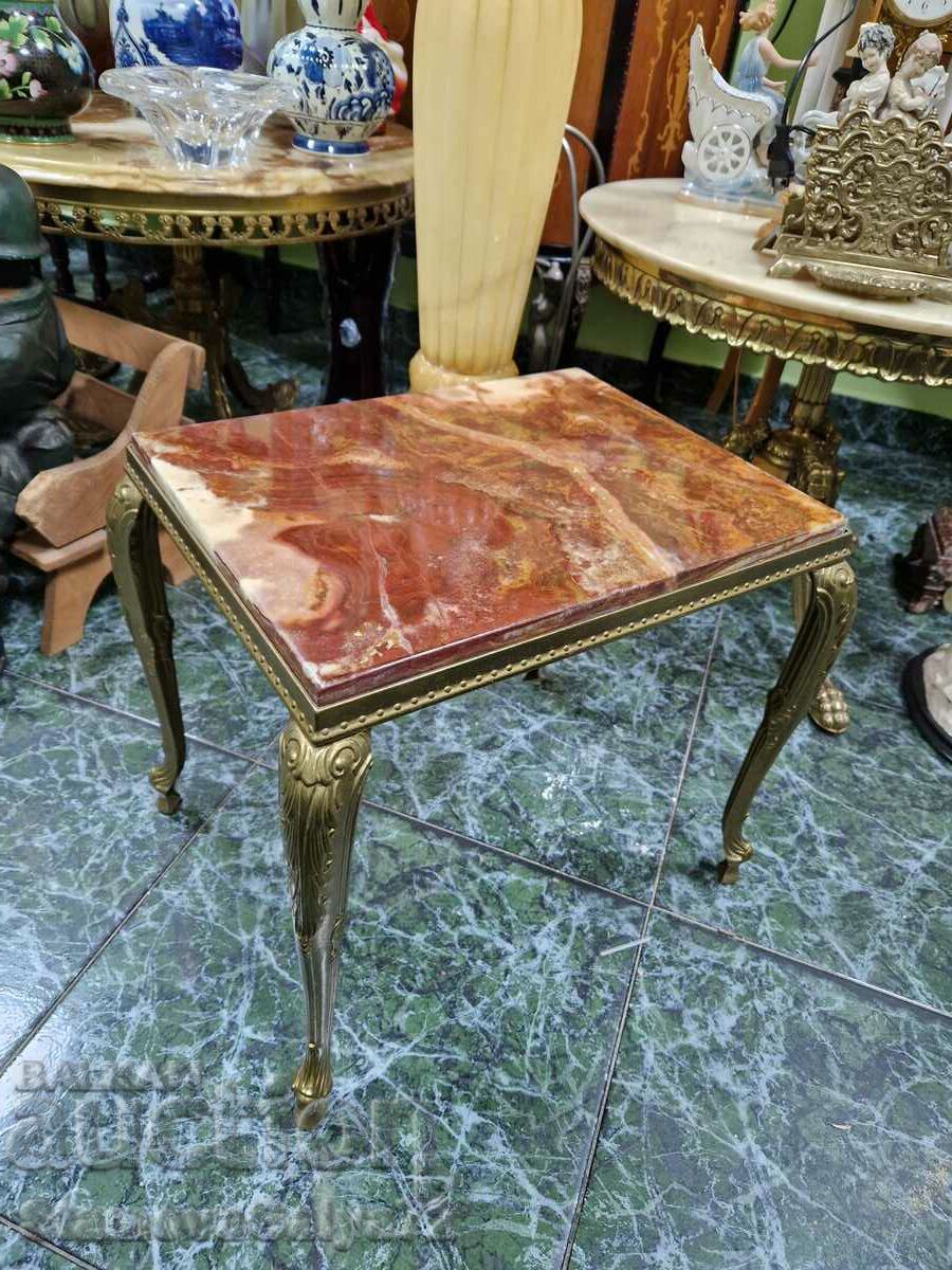 Unique antique bronze coffee table with marble top