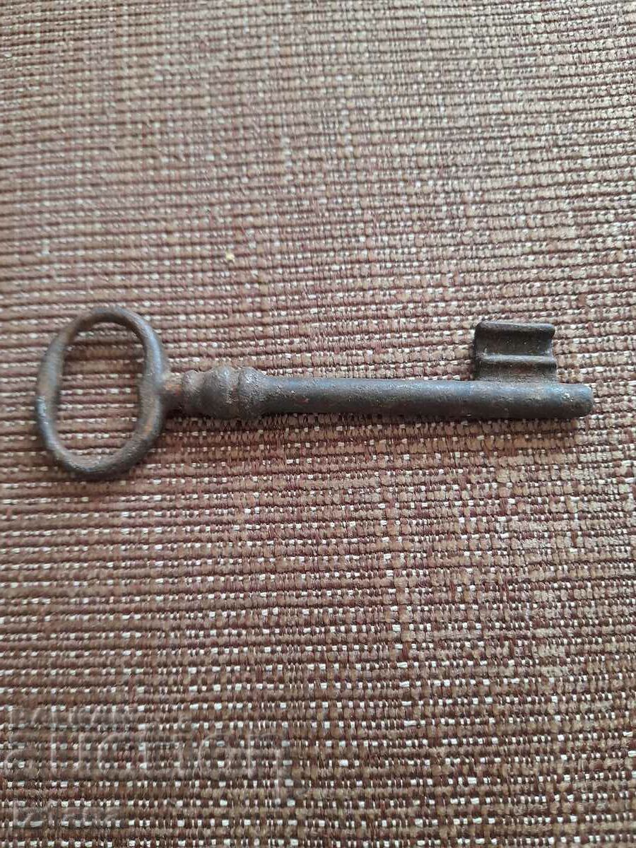Auction Old metal key Auction Old metal key