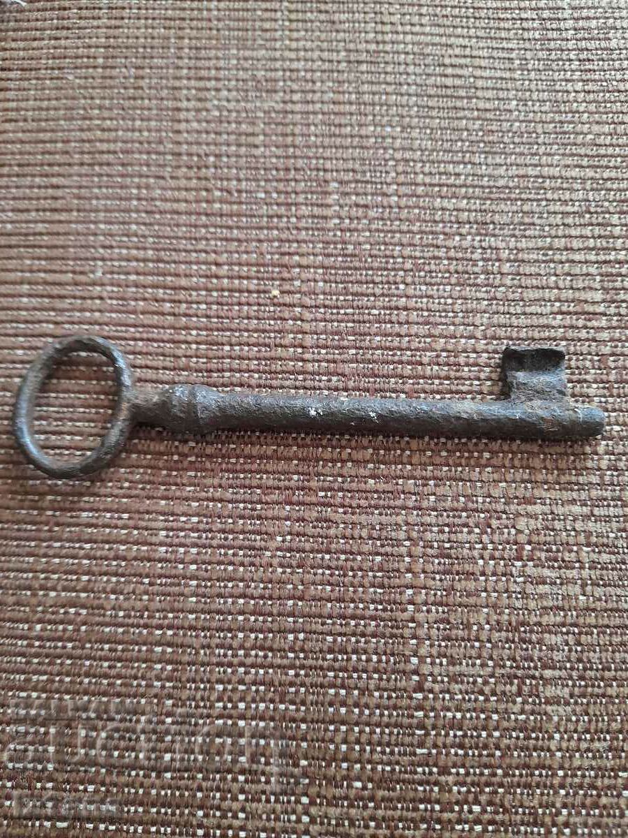 Auction Old metal key Auction Old metal key