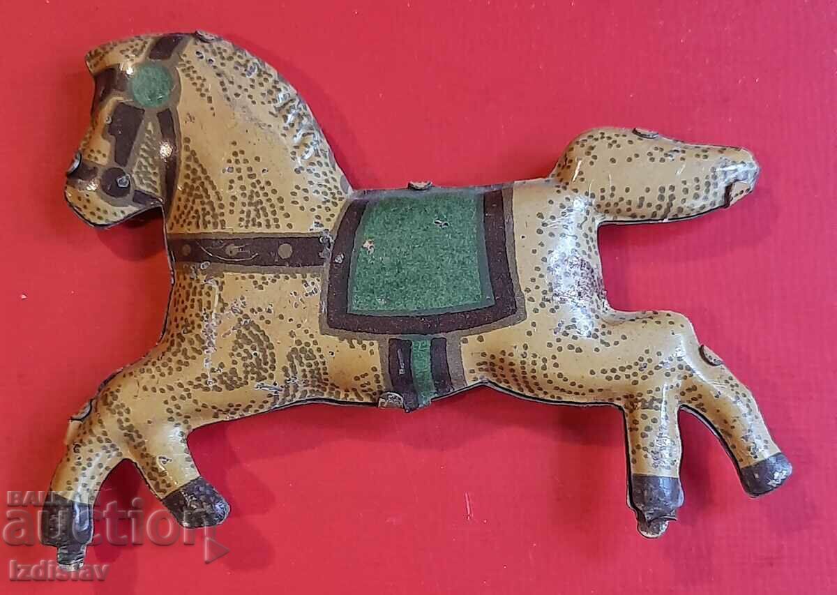 Auction Old tin horses part of a carousel Auction Old tin horses part of a carousel