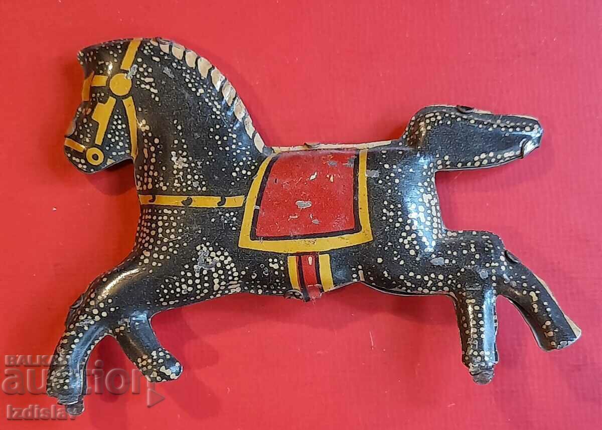 Παράδοση Παλιά άλογα από κασσίτερο μέρος ενός καρουζέλ