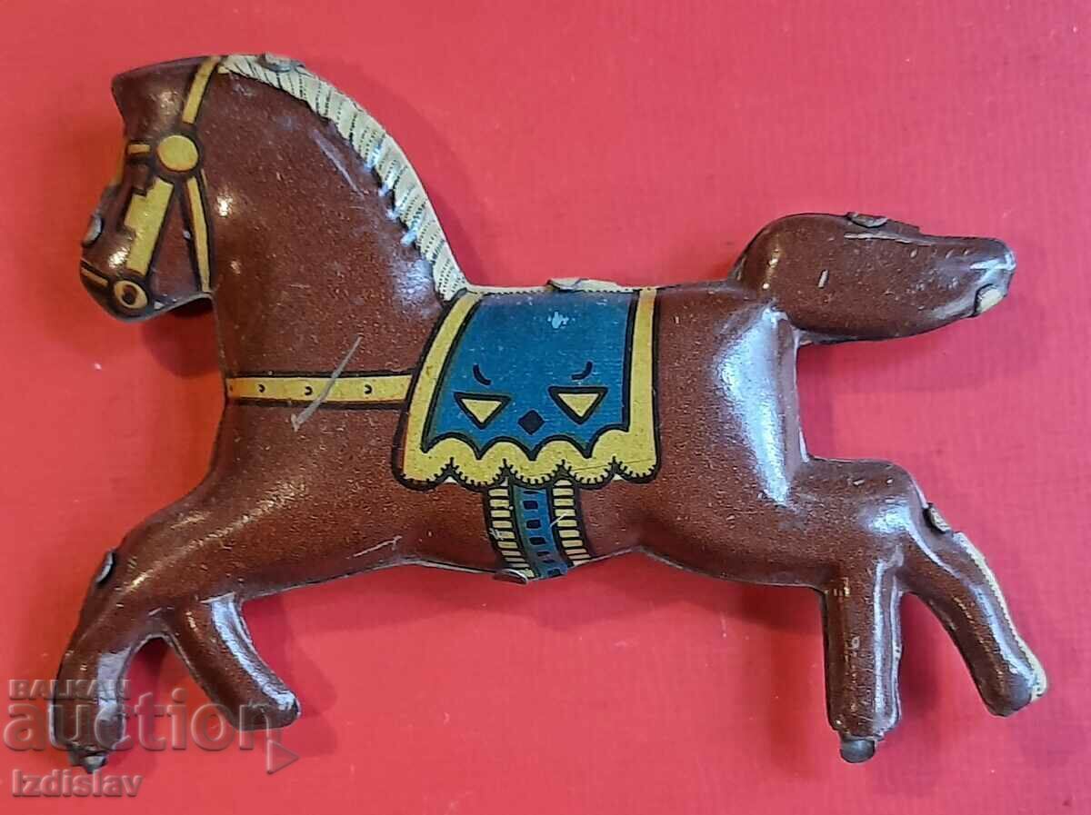 Old tin horses part of a carousel - 5