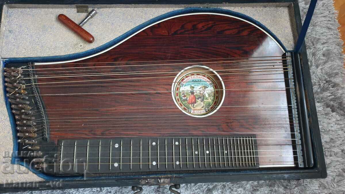 Old musical instrument zither with price 130.00 BGN | € 66.47 Old musical instrument zither with price 130.00 BGN | € 66.47