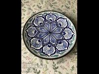A beautiful porcelain plate with markings