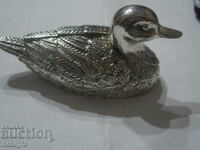 Old silver duck.