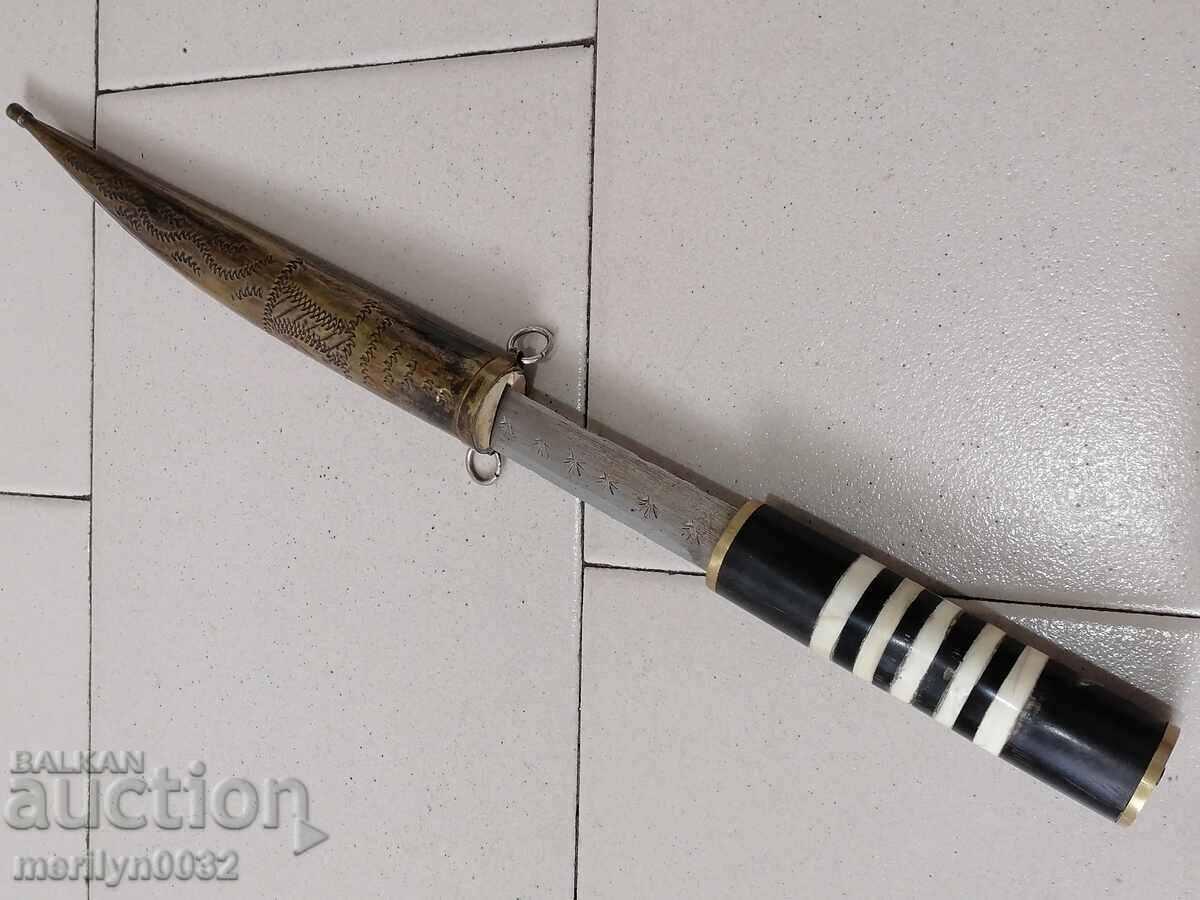 Delivery of An old dagger with a kaniya knife with a tanned buffalo horn blade Delivery of An old dagger with a kaniya knife with a tanned buffalo horn blade