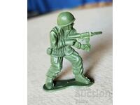 Plastic retro soldier figure with machine gun
