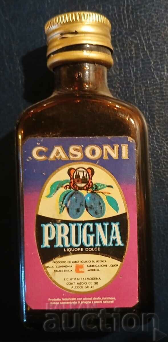 Old bottle/cartridge of Casoni prugna alcohol (plum liqueur)