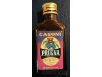 Old bottle/cartridge of Casoni prugna alcohol (plum liqueur)