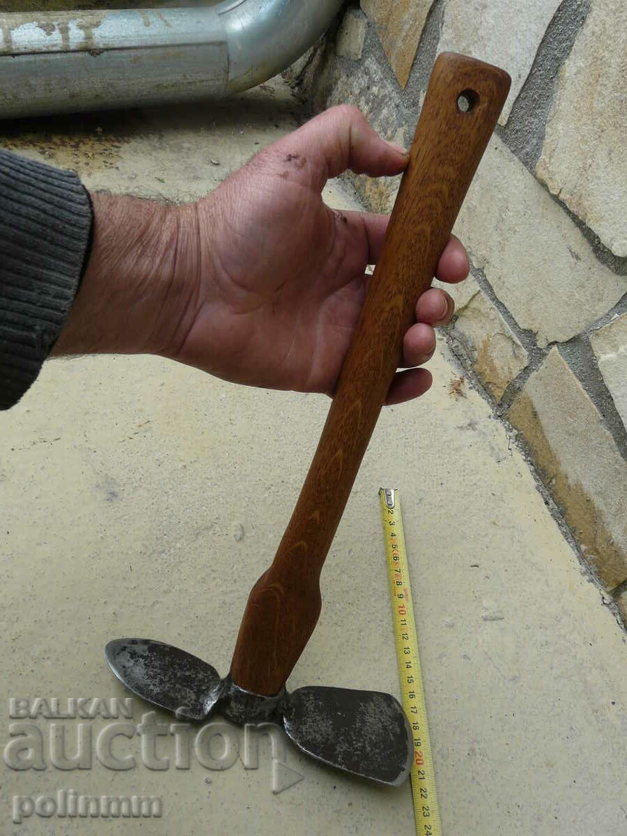 Delivery of An old forged trench tool Delivery of An old forged trench tool