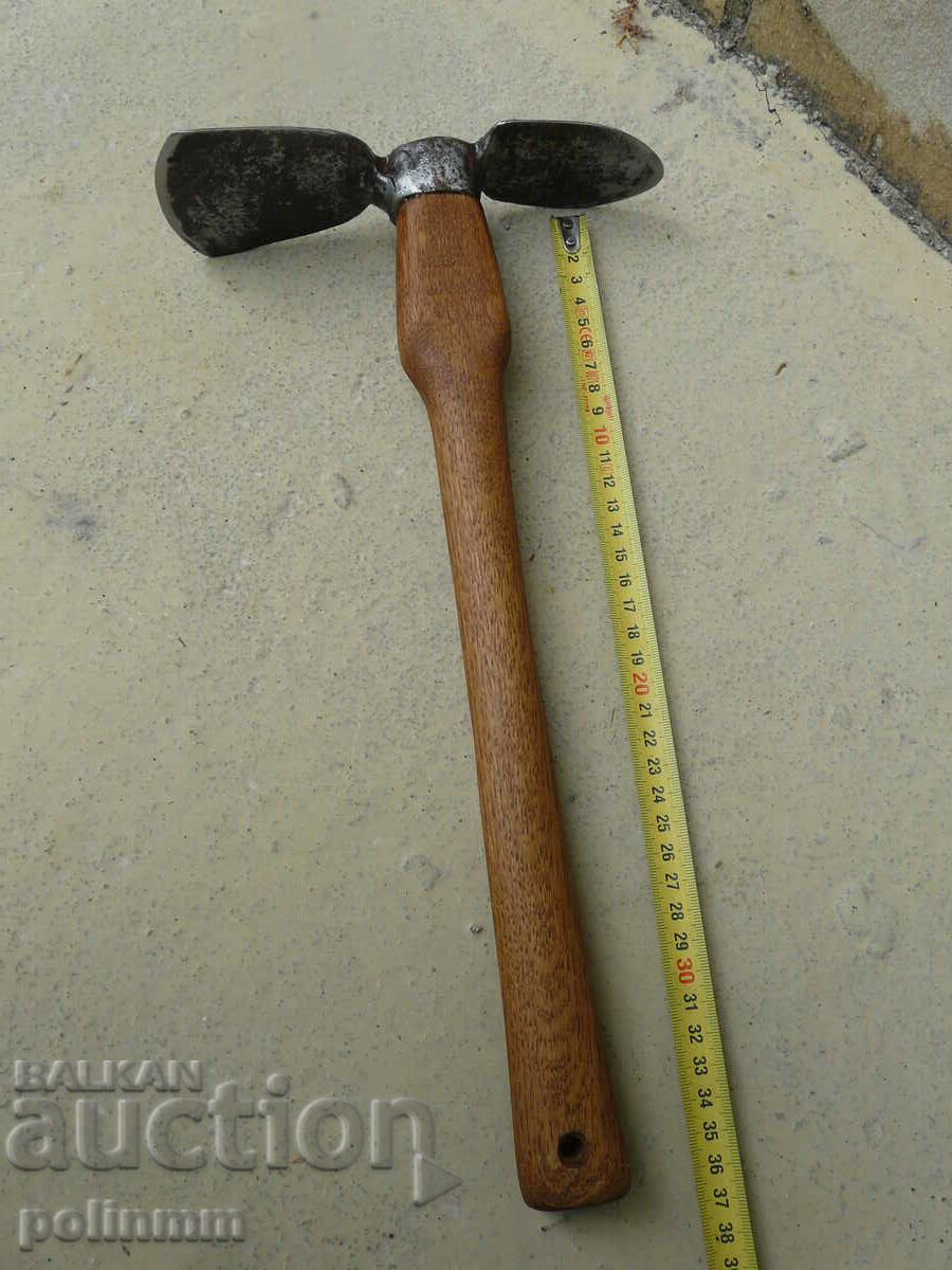 An old forged trench tool