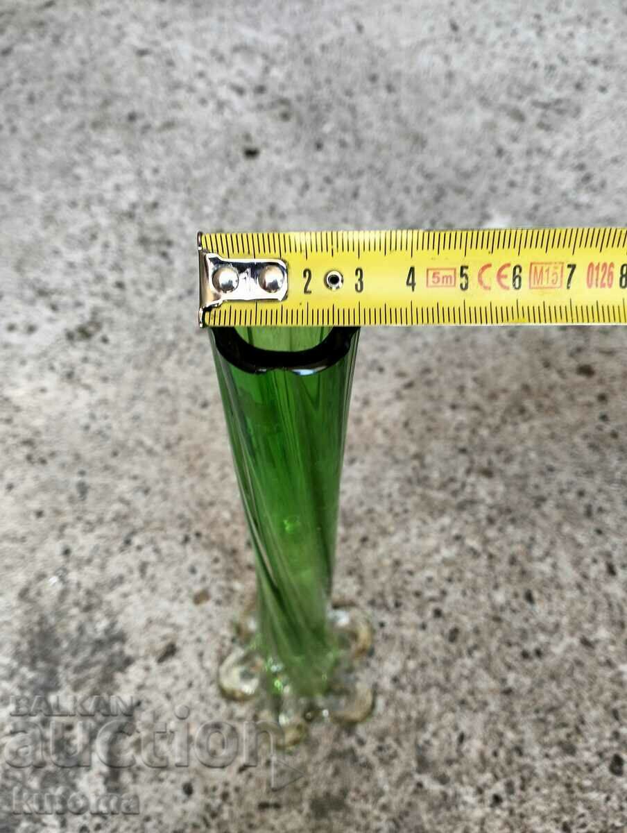 Auction  An old green vase of the twisted elephant's foot type