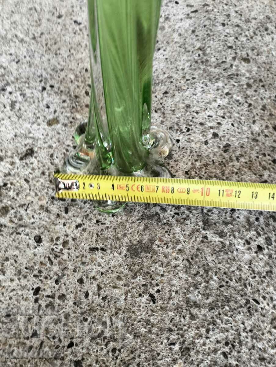 Delivery of An old green vase of the twisted elephant's foot type