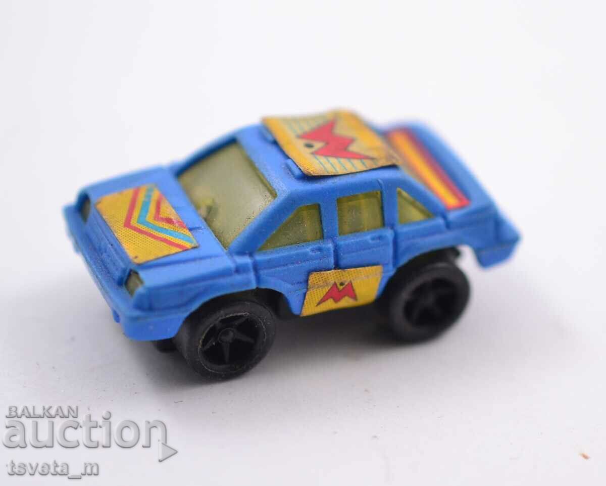 Chocolate egg trolley toy plastic with price 3.00 BGN | € 1.53 Chocolate egg trolley toy plastic with price 3.00 BGN | € 1.53