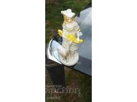 PORCELAIN STATUETTE