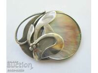 Old ladies' silver brooch and locket jewel silver mother-of-pearl