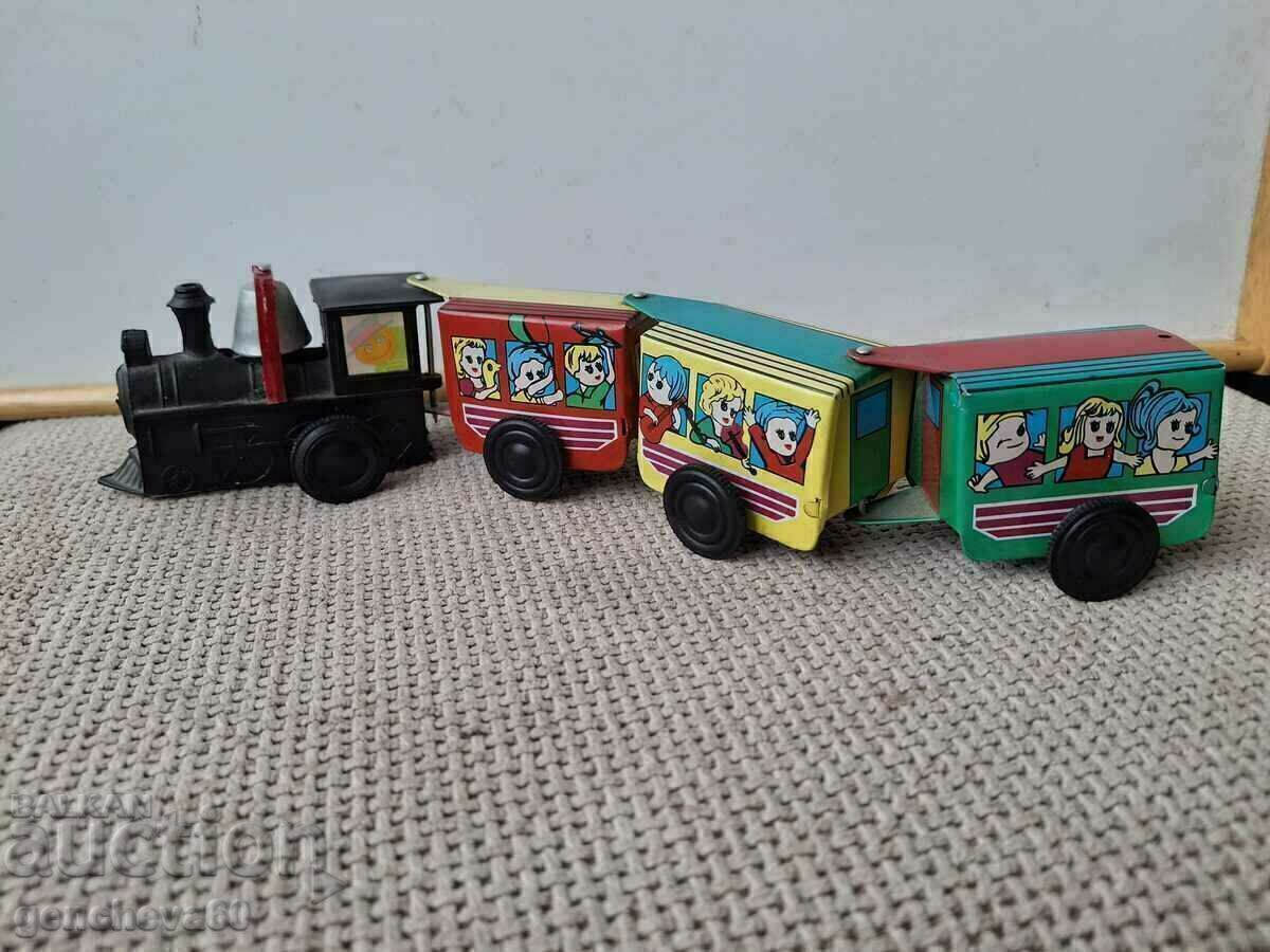 Delivery of Mechanical tinplate old train with a bell Delivery of Mechanical tinplate old train with a bell