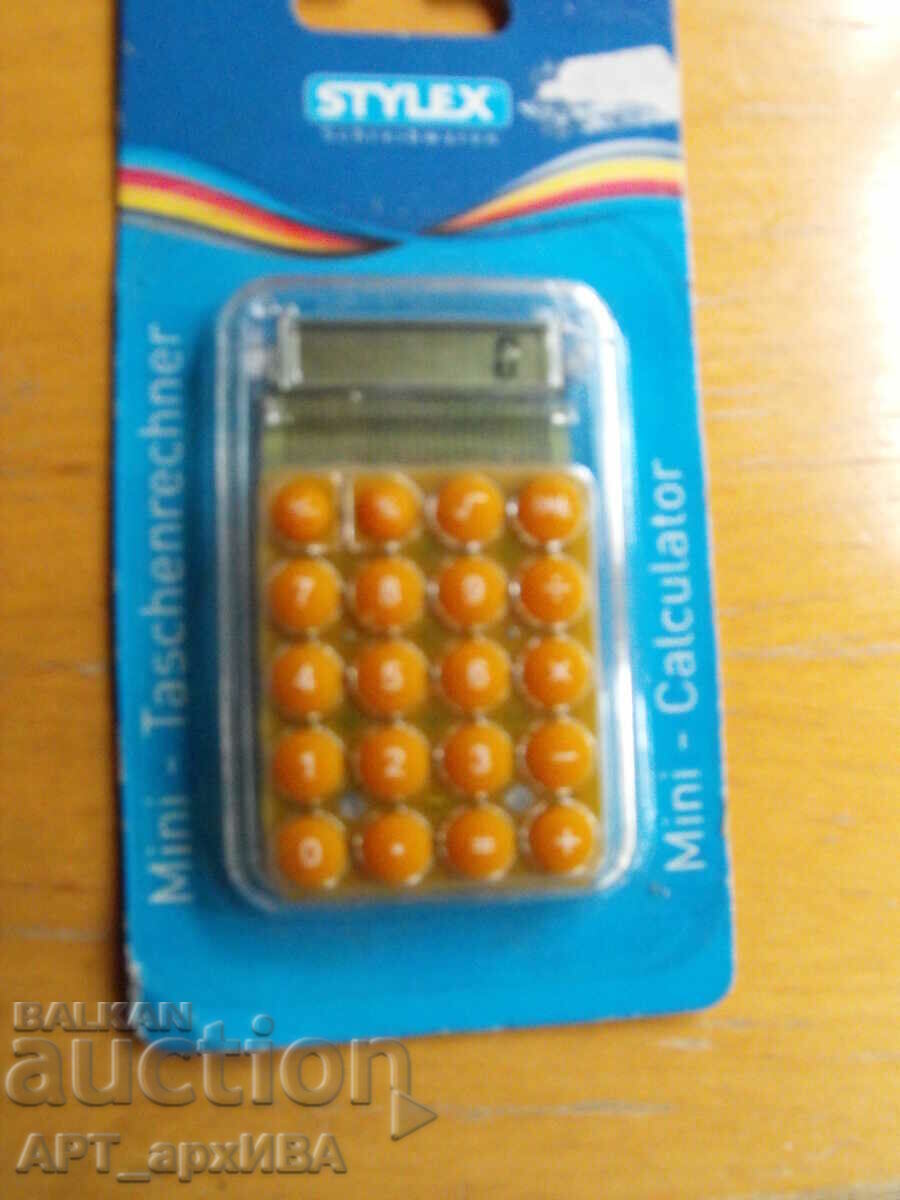 Електронен калкулатор от 1990-те год.,  ФР Германия.