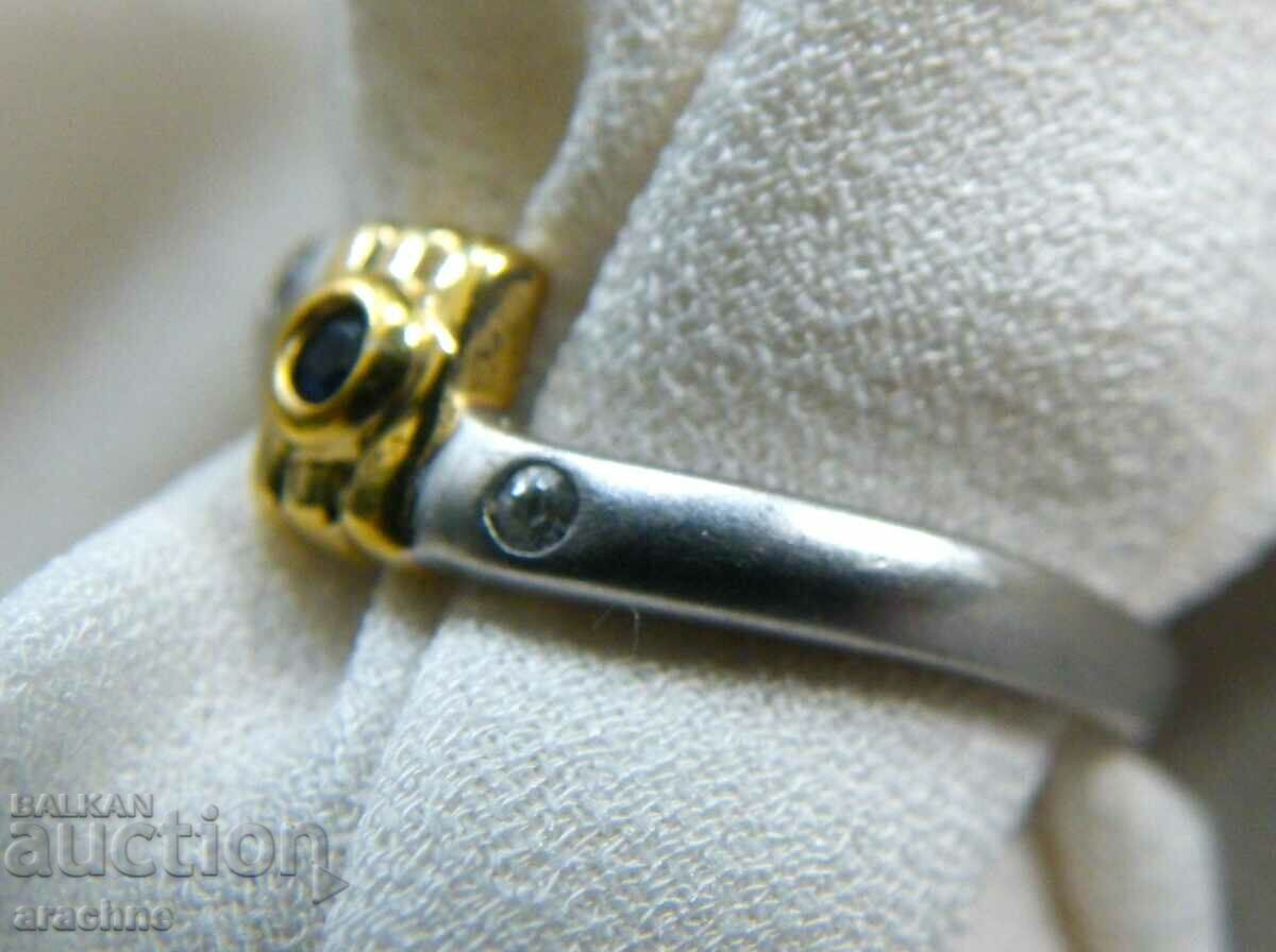Delivery of Silver ring with gold plating, natural sapphire and topaz Delivery of Silver ring with gold plating, natural sapphire and topaz