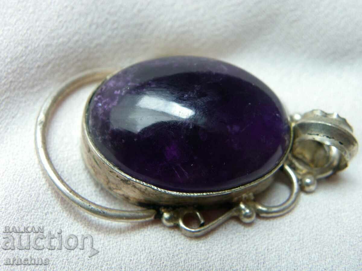 Large silver locket with tanzanite with price 180.00 BGN | € 92.03 Large silver locket with tanzanite with price 180.00 BGN | € 92.03