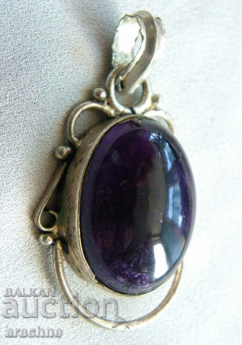 Delivery of Large silver locket with tanzanite Delivery of Large silver locket with tanzanite