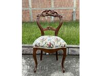 Vintage chair with wood carving