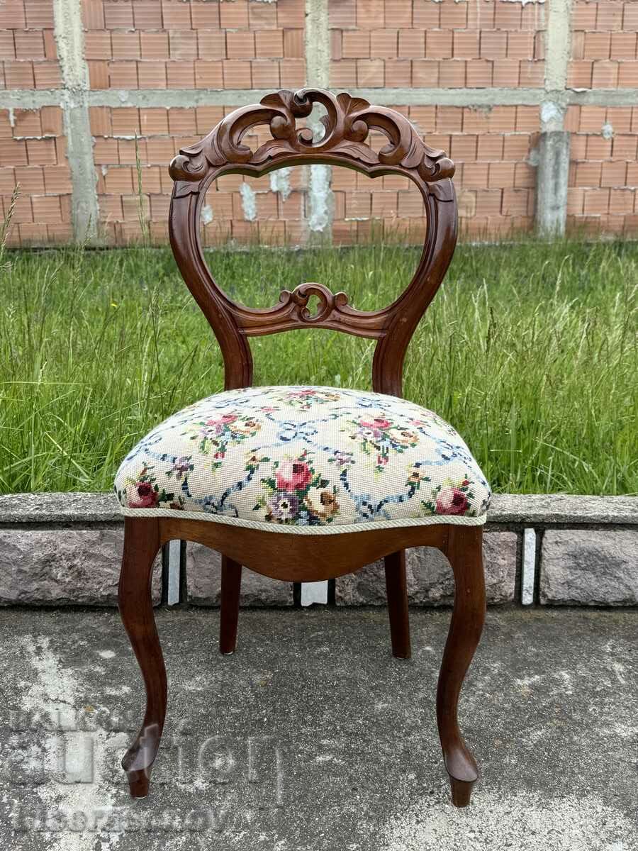 Vintage chair with wood carving