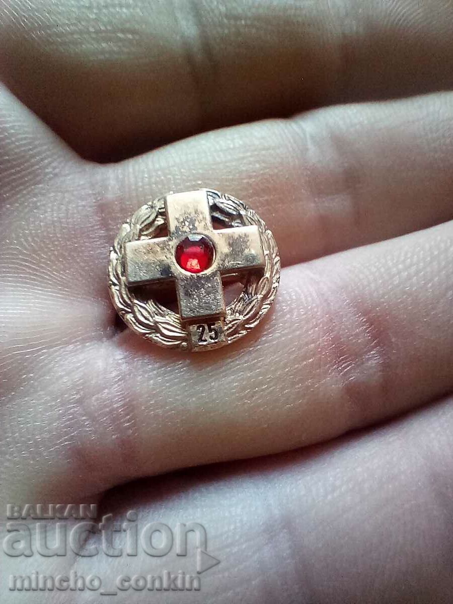 Red cross silver badge with gilding 25 years.