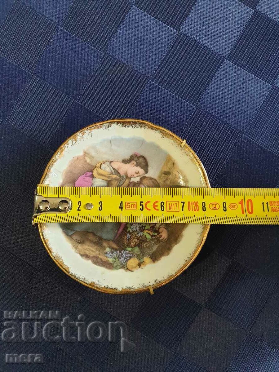 Delivery of Singer Limoges porcelain saucer Delivery of Singer Limoges porcelain saucer