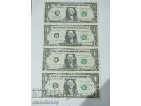 Lot of 4 uncut and unbent 1985 dollars.